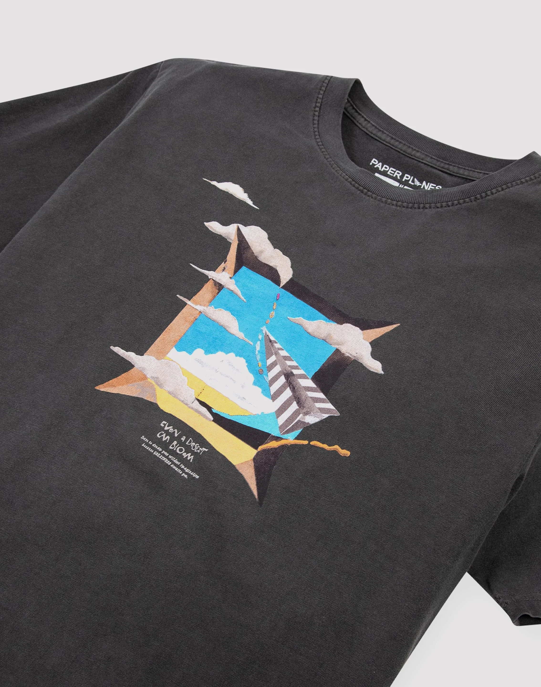 Paper Planes Ip Holdings Llc Dare To Dream Black Washed Tee